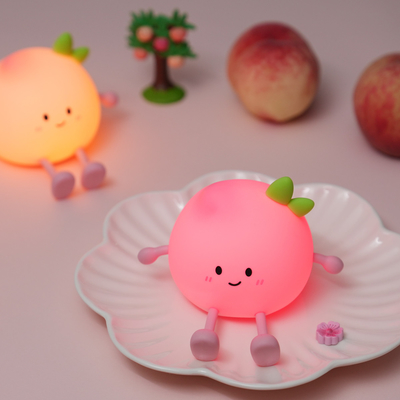 2024 New Creative Peach Shape Night Lamp Soft Silicone 7 Color Changing Eye Care Night Light For Children Gifts Desk Lamp
